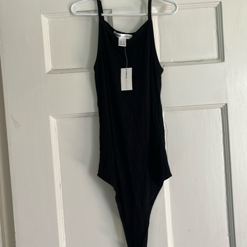 Urban Heritage, black body suit. New with tags. Snap bottom.